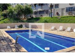 Estrada do Capenha 1127 bloco 04 apartamento 308. Apartamento com  52 m2 e uma vaga de garagem. Divide-se em sala e dois quartos cozinha banheiro e area.  Condomínio com piscina churrasqueiras quadra parque infantil e salão de festas